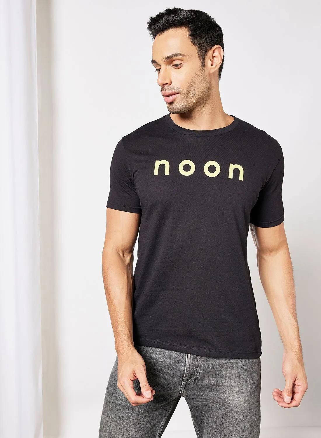 تي شيرت قطن Supima للجنسين من Noon Merch مع طباعة الشعار