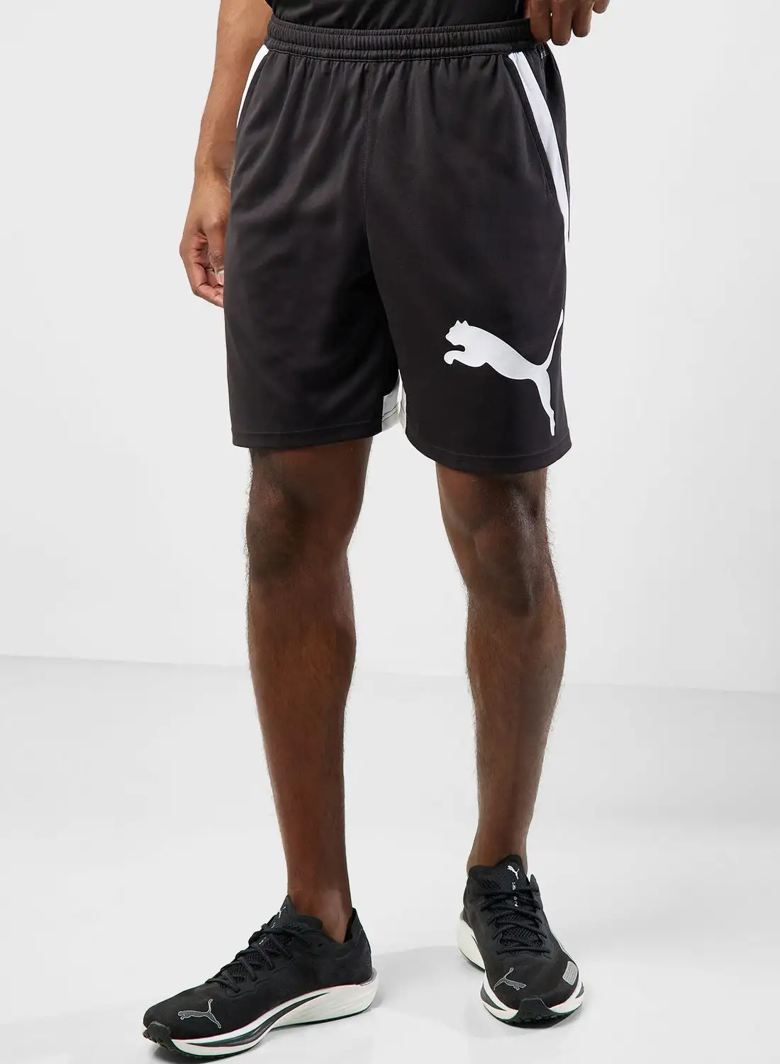 PUMA Train All Day 8” Knit Shorts