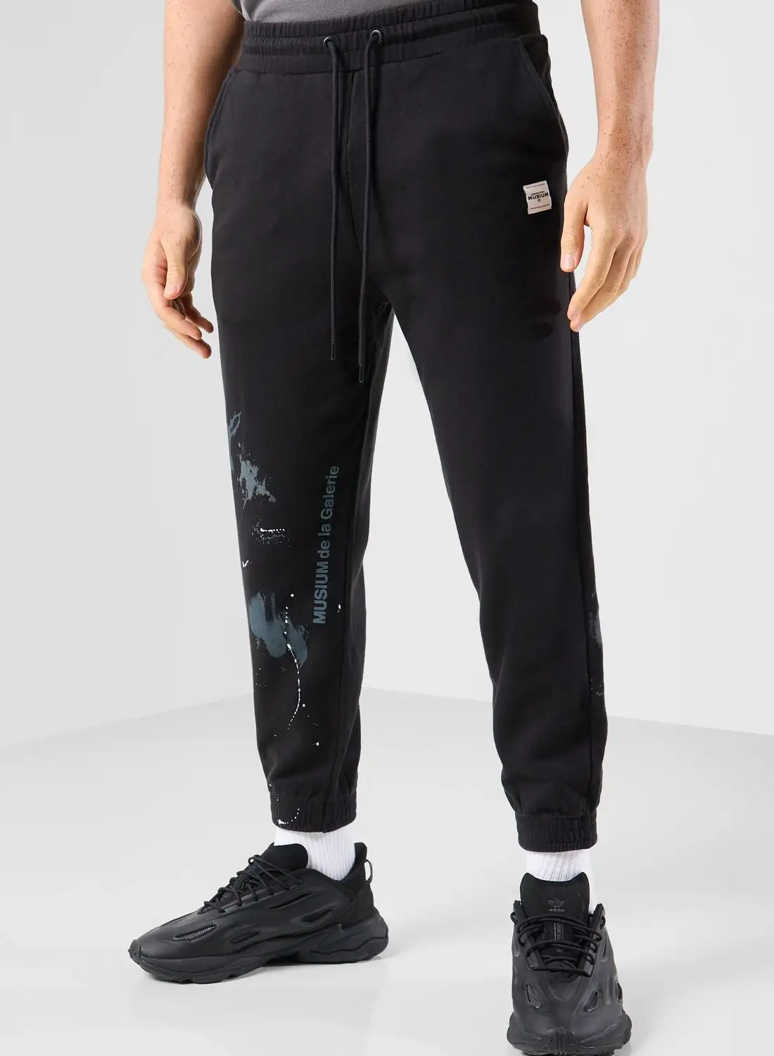 MUSIUM DIV. Logo Cuffed Sweatpants