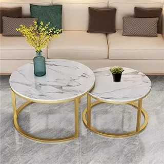 sama steel center table consisting of two pieces with dimensions : diameter 80cm * height 45cm and diameter 60cm made of steel with gold electrostatic coating and marble