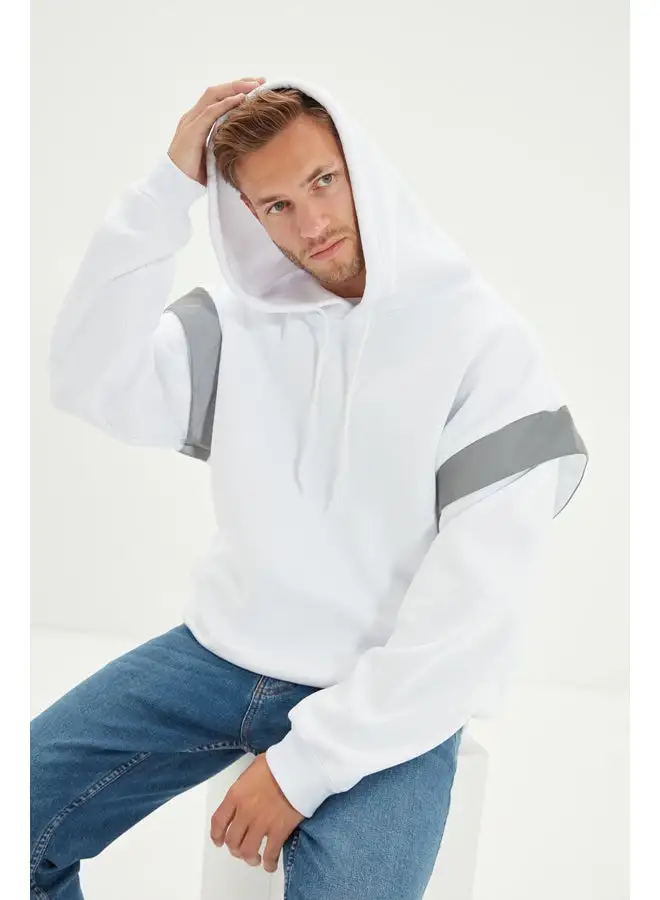 trendyol White Men's Oversized Fit Hooded Sweatshirt with reflective detail and a soft pile inside. TMNSS20SW0205.