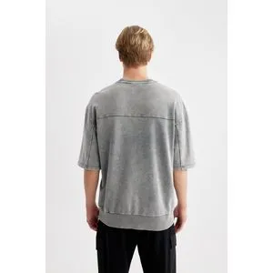 Defacto Man Loose Fit Crew Neck Short Sleeve Knitted T-Shirt.