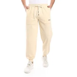 Air Walk Elastic Waist & Hem Solid Pattern Sweatpants - Beige