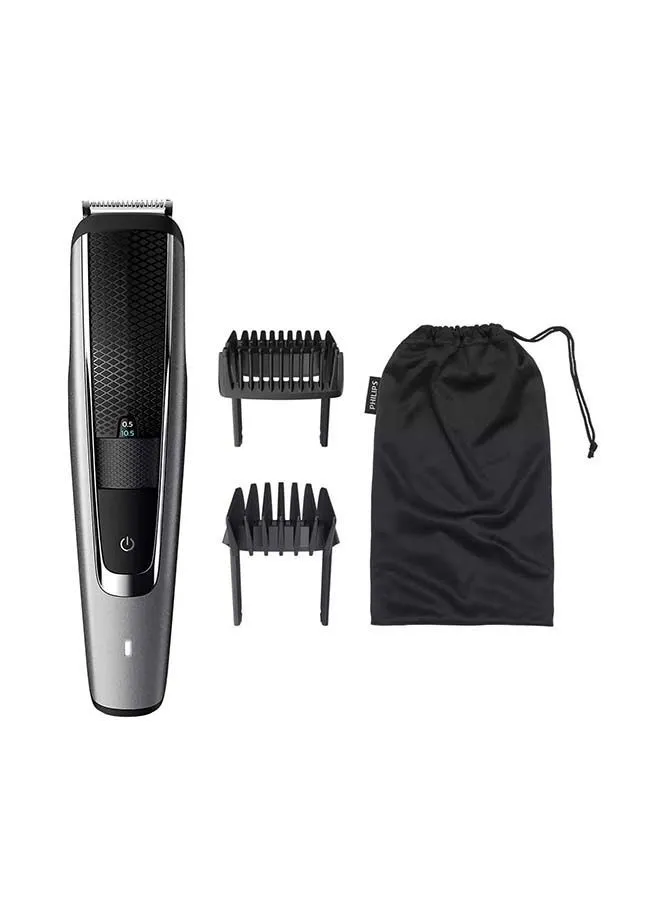 تقنية Trim-n-Flow Pro من Philips، واقي معدني كامل مقاس 41 مم، وشفرات من الفولاذ المقاوم للصدأ، سلكية ولاسلكية مع بطارية Li-ion (لمدة 90 دقيقة من الاستخدام اللاسلكي/شحن لمدة ساعة)، ومشطان قابلان للقفل قابلان للتعديل لـ 28 إعدادًا عبر عجلة التكبير/التصغير من مشط لحية خفيفة بطول 3 إلى 28 مم، قابل للغسل بنسبة 100%، وضع Turbo. حقيبة ناعمة ضمان لمدة عامين، مؤشر البطارية، فضي رمادي وأسود، صندوق مغلق،