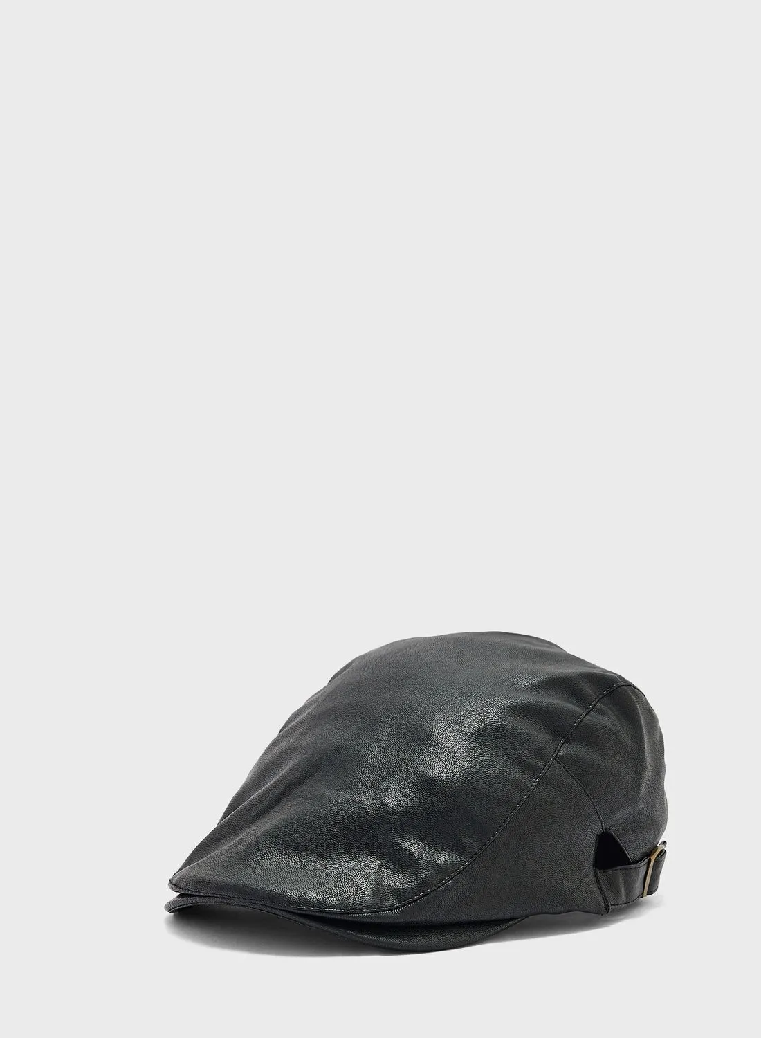 قبعة مسطحة من الجلد الصناعي من روبرت وود