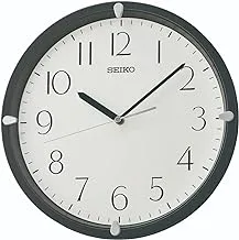ساعة حائط من ساعات سيكو مع قرص أبيض وحقيبة سوداء QHA007J