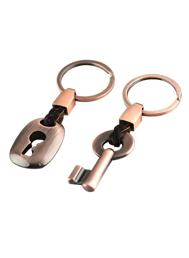 شاربدو سلسلة مفاتيح جلدية على شكل مفتاح قفل مكونة من قطعتين باللون البني