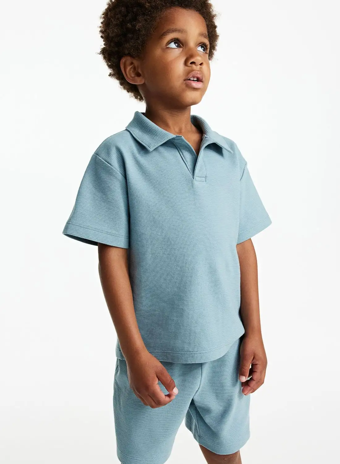 قميص بولو جيرسي للأطفال من H&M