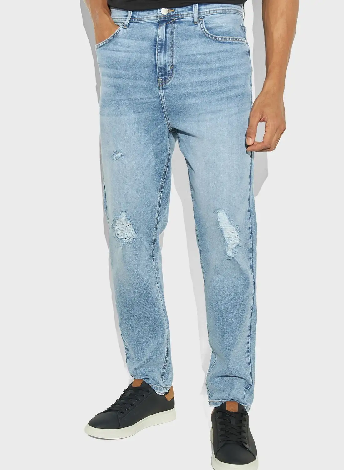 Iconic Light Wash Ripped Jeans