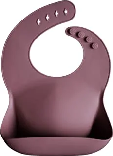 mushie Silicone Baby Bib | Adjustable Fit Waterproof Bibs | Easy Wipe Baby Feeding Bibs | 4 Adjustable Sizes with Deep Front Pockets | 100% BPA and Phthalate free | Designed in Sweden | Dusty Rose